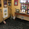 Family photos, athletic moments and a collection of shovels symbolizing the growth and expansion during Tom Jurich’s reign